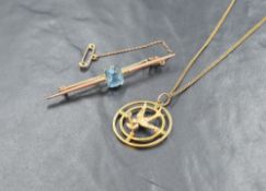 A yellow metal Edwardian pendant stamped 9ct depicting a peace dove having seed pearl and peridot