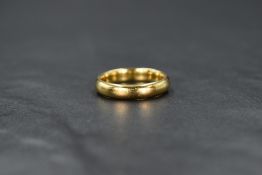 An 18ct gold wedding band, of plain rounded form, ring size M-N, 5.7g