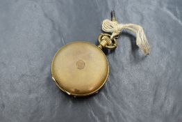 An 18ct gold plated full hunter key wound pocket watch, the white dial having Roman numerals, with