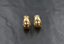 A pair of 9ct gold hoop earrings, of thick rounded form with clip closures, 4.4g