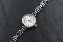 A lady's silver wrist watch by Sekonda having baton dial to silvered face in a plain circular case