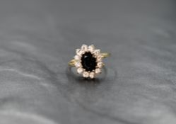 A 9ct gold sapphire and cubic zirconia cluster ring, size P/Q & approx 2.6g