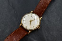 A gent's 9ct gold 1960's Smiths Astral manual wrist watch having Arabic quarter numerals, baton