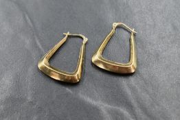 A pair of 9ct gold hoops earrings of angled form, approx 1.9g