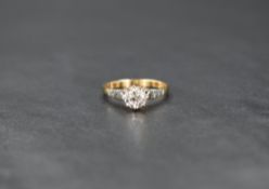 An 18ct gold diamond solitaire ring, the round brilliant cut diamond measuring approximately 0.50ct,
