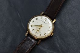 A gent's 9ct gold Smiths Astral manual wrist watch having Arabic numerals and subsidiary seconds