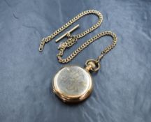 A gold plated Full Hunter top wound pocket watch marked The Angus to mechanism and face, having