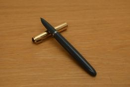 A Parker 51 MKII aerometric fill fountain pen in grey with rolled gold cap.