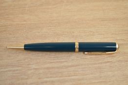 A Parker Duofold propelling pencil in green with single gold chevron cap band
