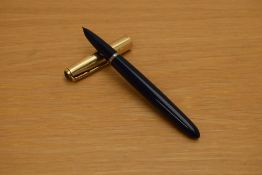 A Parker 51 MKII aerometric fill fountain pen in navy blue with rolled gold cap. Very small dents to