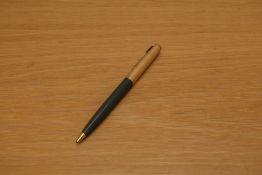 A Parker 51 propelling pencil in grey with rolled gold cap.