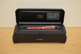 A boxed Parker Duofold Centennial converter fill fountain pen in Jasper red with gold trim having