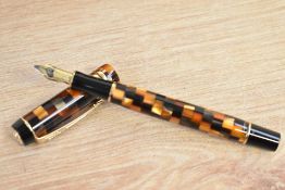 A boxed Parker Duofold International converter fill fountain pen in Check amber having Duofold