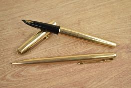 A boxed Parker 61 Custom Insignia converter fill fountain pen and Propelling pencil in rolled gold