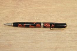 A Parker Televisor Deluxe Challenger propelling pencil in red and black marble