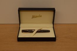 A boxed Stipula Isola Lipari piston fill limited edition (39/40) fountain pen in honey and gold with