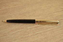 A Parker 61 propelling pencil in black with rolled gold cap