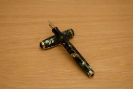A Parker Vacumatic button fill fountain pen in green and black marble with two narrow gold cap bands