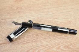 A boxed Parker Duofold International converter fill fountain pen in Black mosaic with chrome trim