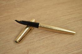 A Parker 61 Consort converter fill fountain pen in rolled gold