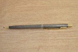 A Parker 75 Cicele propelling pencil in sterling silver with gold trim