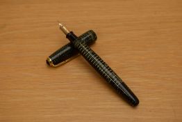 A Parker Vacumatic fountain pen in emerald pearl with two narrow gold cap rings having a 14K