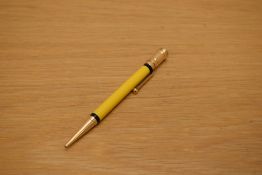 A Parker Duofold propelling pencil in Mandarin Yellow