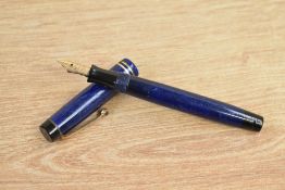A Parker Duofold Junior Streamlined button fill fountain pen in lapis lazulii with two gold bands to