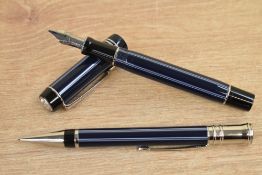 A boxed Parker Duofold Centennial converter fill fountain pen and propelling pencil set in navy