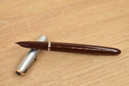 A Parker 51 vacumatic fill fountain pen in Cordovan Brown with Sterling Silver cap with gold fill