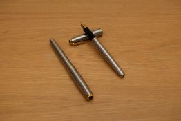 A Parker Sonnet Flighter converter fill fountain pen and rollerball pen with gold trim to the cap