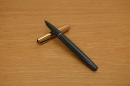 A Parker 51 MKIII aerometric fill fountain pen in grey with rolled gold cap.