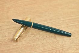 A Parker 51 MKII Demi aerometric fill fountain pen in forest green rolled gold cap. Slight chew to