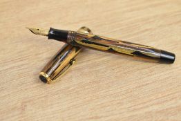 A Parker Duofold Junior button fill fountain pen honey and black geometric (toothbrush) pattern with