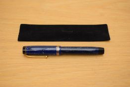 A Parker Duofold Senior button fill fountain pen in lapis lazulii with two gold bands to the cap