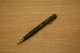 A Parker Moderne propelling pencil in green and gold marble