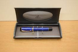 A boxed Parker Duofold Centennial converter fill fountain pen in Lapis lazulii with gold trim having