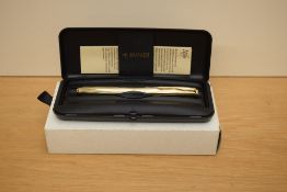A boxed Parker Sonnet Dimonte G converter fill fountain pen in gold having Parker nib