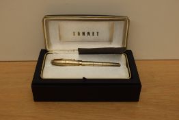 A boxed Parker Sonnet Vermeil Crocodile converter fill fountain pen in gold plate having Parker