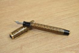 A Parker Vacumatic fountain pen Golden web pattern with two narrow gold cap bands having Parker