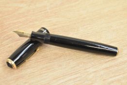 A Parker Vacumatic Junior in black with two narrow gold cap bands having Parker Vacumatic reg TM