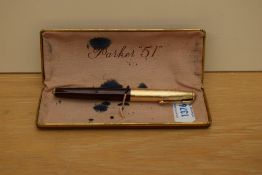 A boxed Parker 51 vacumatic fill fountain pen in Cordovan brown with gold filled diamond clip cap