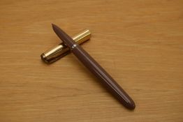 A Parker 51 MKII aerometric fill fountain pen in cocoa with rolled gold cap.