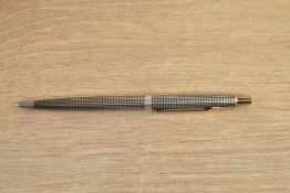 A Parker 75 Cicele ballpoint pen in sterling silver with gold trim