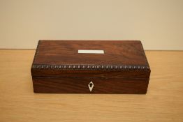 A Rosewood desk tidy with pen, nib boxes, inkwell and comes with key 18.5x8.5cm