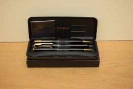 A boxed Parker Sonnet converter fill fountain pen, propelling pencil and ballpoint pen set in