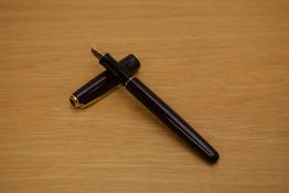 A Parker Sonnet Converter fill fountain pen in laque red with gold trim having Parker nib