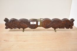 A mid / late 20th century Indian carving set, carved depicting a double headed dragon on brass