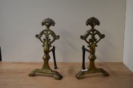A large pair of brass fire dogs / andiron's moulded in the classical style, h37. Condition: slight