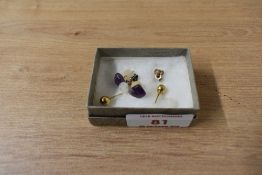 A pair of 9ct gold ball stud earrings, along with a pair of amethyst chip stud earrings